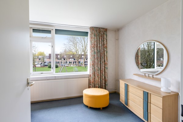 Foto - Te koop: tussenwoning gelegen aan groenvoorziening